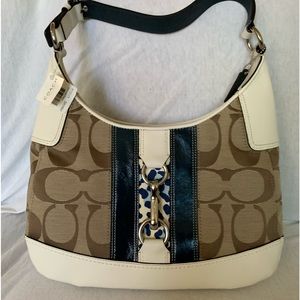 Authentic Coach leather hobo style shoulder bag.